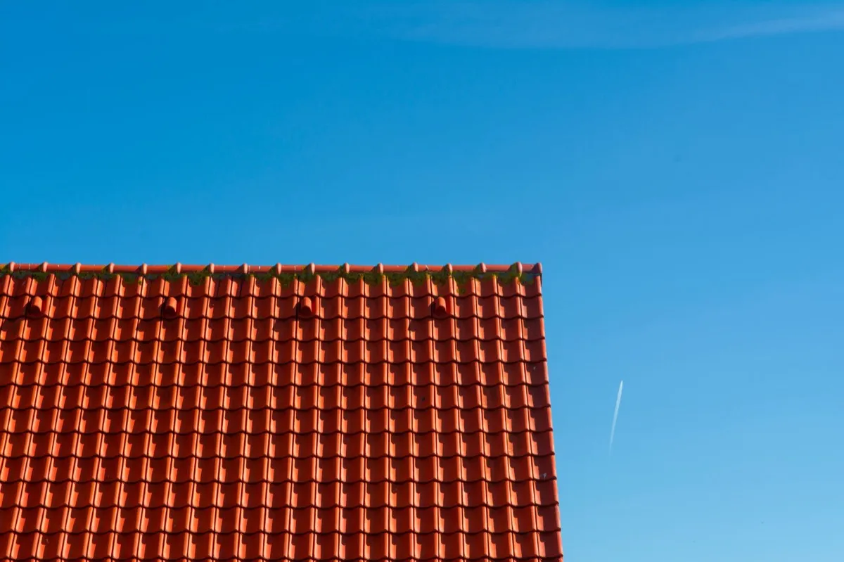 Tile roof gable in full sun, the kind of exposure that sets roof life in Wilmington, DE